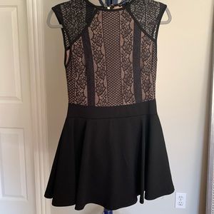 Lace romper with skirt overlay